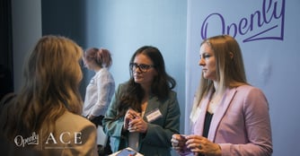 Danielle Clifford and Danielle Wyman talk to an independent agent at ACE. 