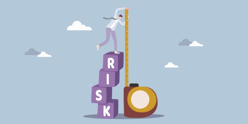 An illustration of a person standing on building blocks that read "RISK" with a tape measurer.