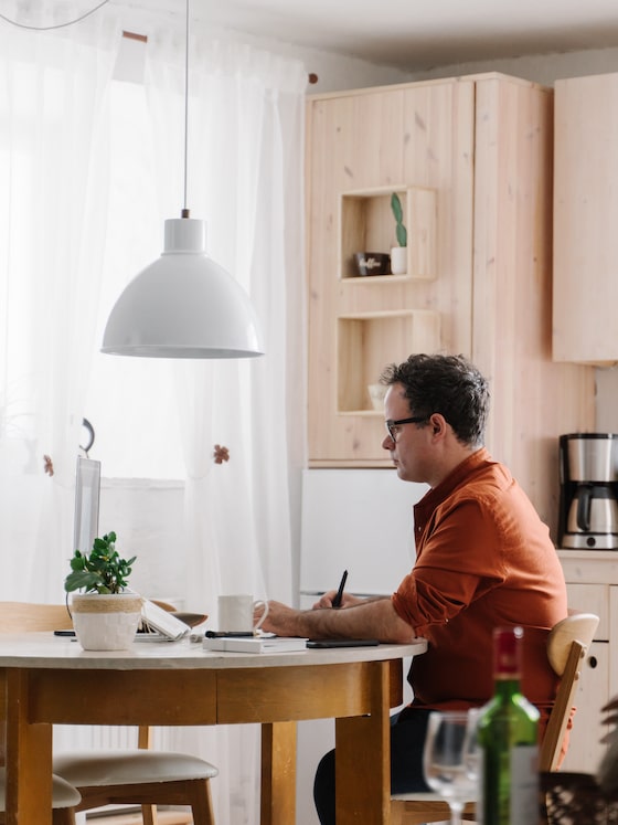 man-working-in-dining-room.a961d02-1