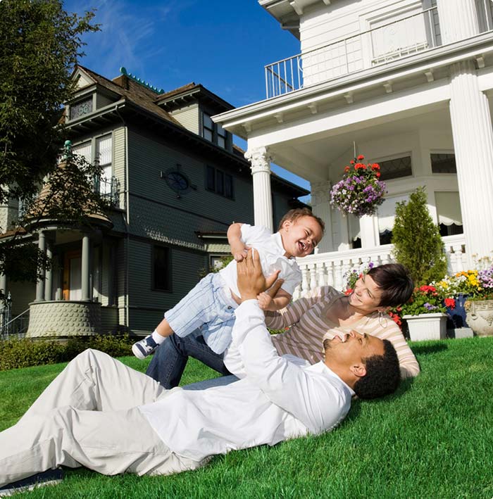 Family playing outside home insured by Openly